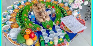 Sắc Hoa Đầu Đời: Cát Tường Và Đồng Tiền Trên Mâm Cúng Mụ Bé